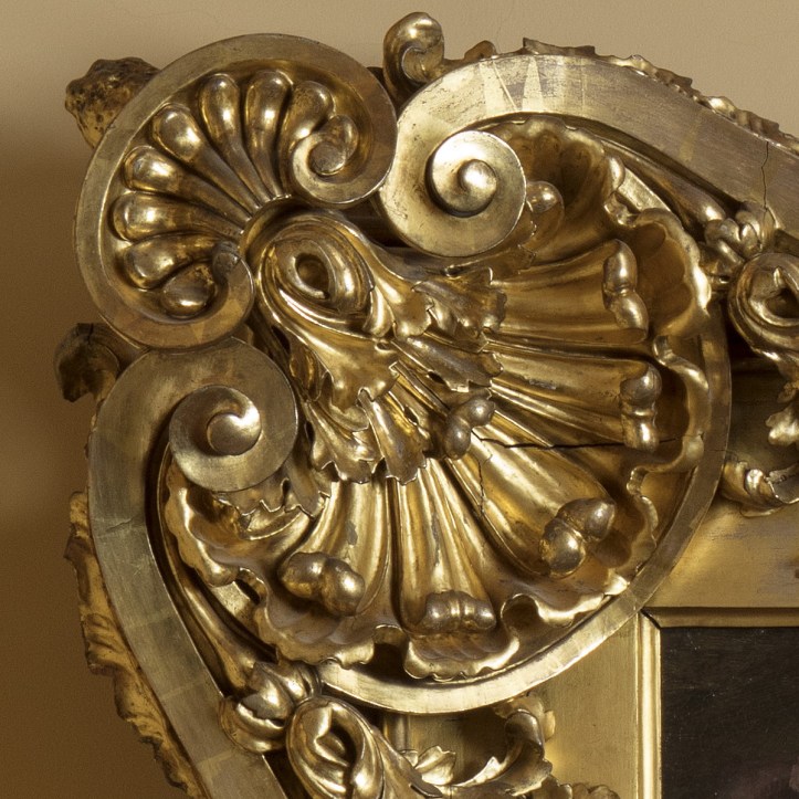 Detalle del marco barroco (mediados del siglo XVIII) de madera tallada y dorada del "Bautismo de Cristo"(1550-1577) de Orazio Samacchini 